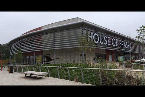 The outside of the 64,000 sq ft store blends with its natural surroundings